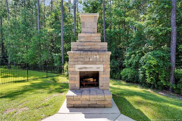 116 School Side Dr, Spring Lake, NC 28390 - view of yard with an outdoor brick fireplace