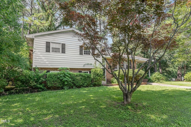 612 Locust Ln, Raleigh, NC 27603 - view of front facade with a front yard