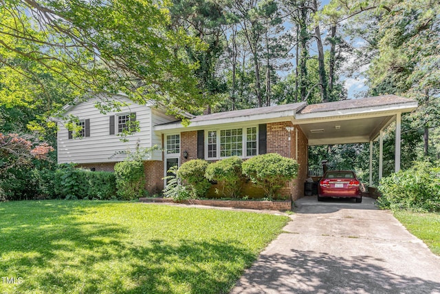 612 Locust Ln, Raleigh, NC 27603 - tri-level home with a front yard, driveway, brick siding, and a carport