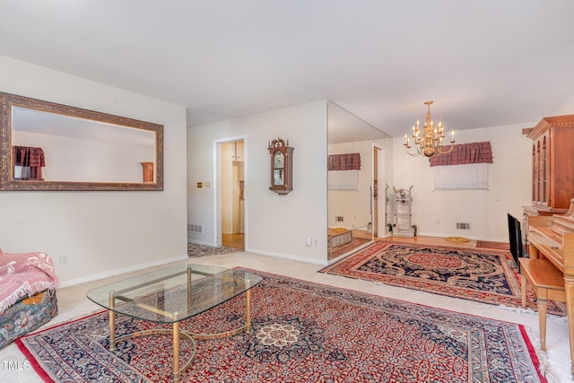 612 Locust Ln, Raleigh, NC 27603 - carpeted living area with a chandelier and baseboards