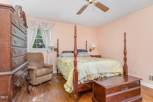 612 Locust Ln, Raleigh, NC 27603 - bedroom with wood finished floors and ceiling fan