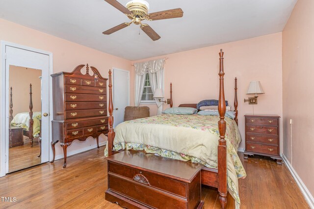 612 Locust Ln, Raleigh, NC 27603 - bedroom with wood finished floors and ceiling fan