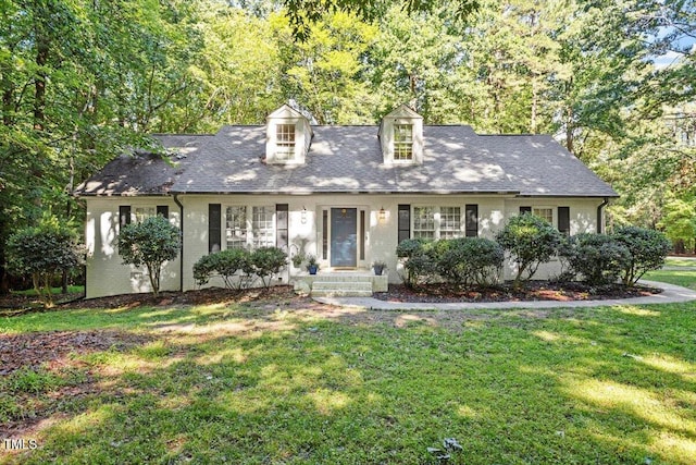 701 Bennington Dr, Raleigh, NC 27615 - new england style home with a front lawn