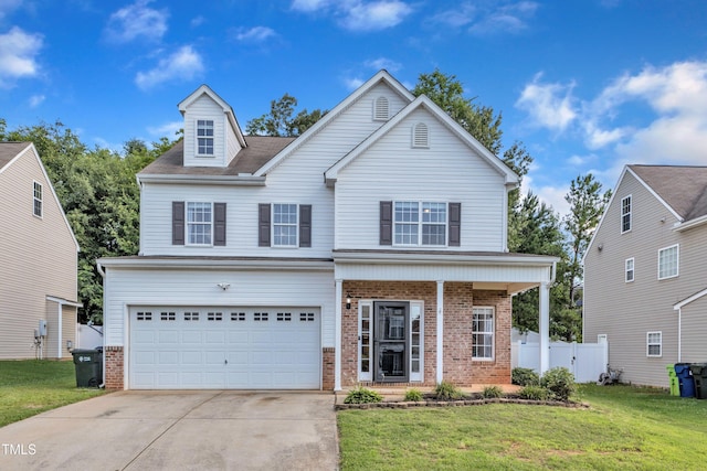 3119 Guiding Light Rd, Raleigh, NC 27610 - traditional home featuring brick siding, driveway, and a garage