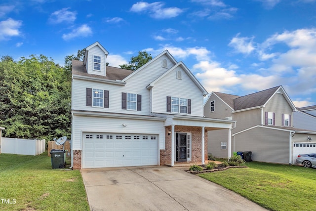 3119 Guiding Light Rd, Raleigh, NC 27610 - traditional-style home with concrete driveway, brick siding, a garage, and covered porch