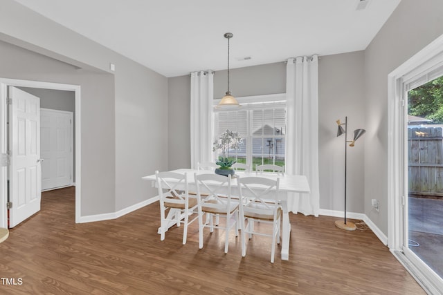 3119 Guiding Light Rd, Raleigh, NC 27610 - dining area featuring wood finished floors and baseboards