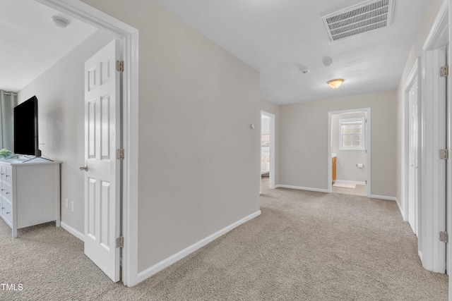 3119 Guiding Light Rd, Raleigh, NC 27610 - hall featuring light carpet and baseboards