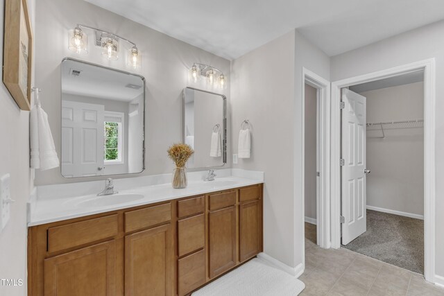 3119 Guiding Light Rd, Raleigh, NC 27610 - full bath with double vanity and a spacious closet