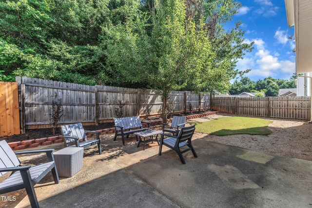 3119 Guiding Light Rd, Raleigh, NC 27610 - fenced backyard with a patio