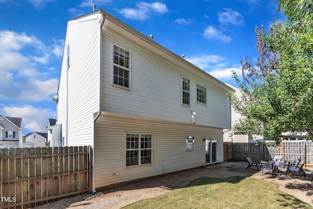 3119 Guiding Light Rd, Raleigh, NC 27610 - rear view of house with a patio