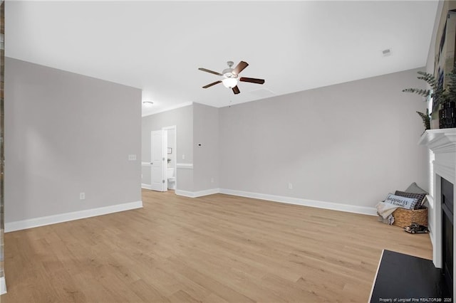786 Century Dr, Cameron, NC 28326 - unfurnished living room with ceiling fan, a fireplace with flush hearth, and light wood-type flooring