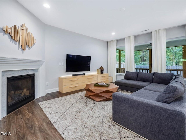 128 Chapel Run Way, Chapel Hill, NC 27517 - living area featuring dark wood finished floors, a fireplace, and recessed lighting