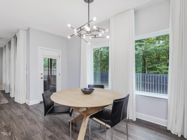 128 Chapel Run Way, Chapel Hill, NC 27517 - dining room with dark wood-style flooring and a chandelier
