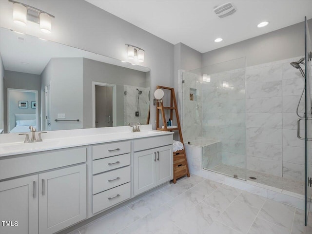 128 Chapel Run Way, Chapel Hill, NC 27517 - full bath featuring a stall shower, double vanity, marble look tiles, and recessed lighting