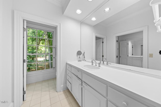 2602 Vintage Hill Ct, Durham, NC 27712 - bathroom with crown molding, vanity, healthy amount of natural light, tile patterned flooring, and recessed lighting