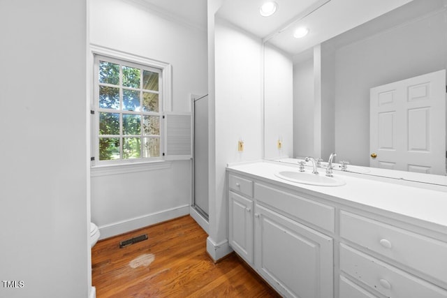 2602 Vintage Hill Ct, Durham, NC 27712 - bathroom featuring vanity, wood finished floors, a shower stall, and recessed lighting