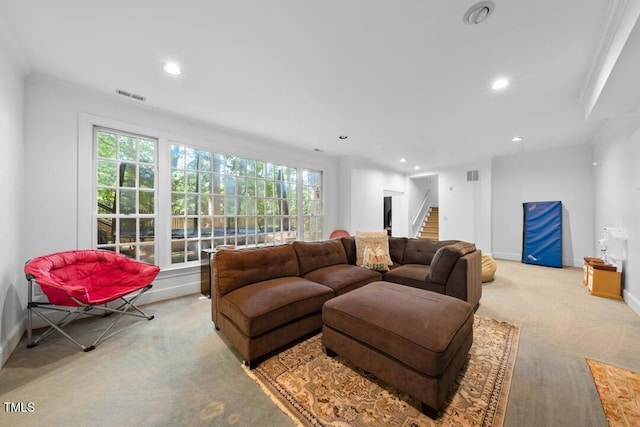 2602 Vintage Hill Ct, Durham, NC 27712 - carpeted living room with stairway, healthy amount of natural light, recessed lighting, and ornamental molding