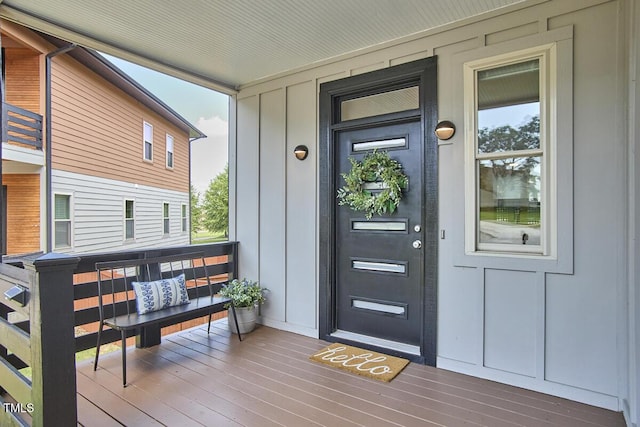931 Ramseur St, Durham, NC 27701 - property entrance featuring board and batten siding and covered porch