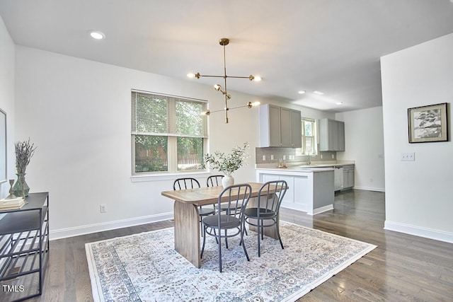 931 Ramseur St, Durham, NC 27701 - dining space with a chandelier, dark wood-type flooring, and recessed lighting