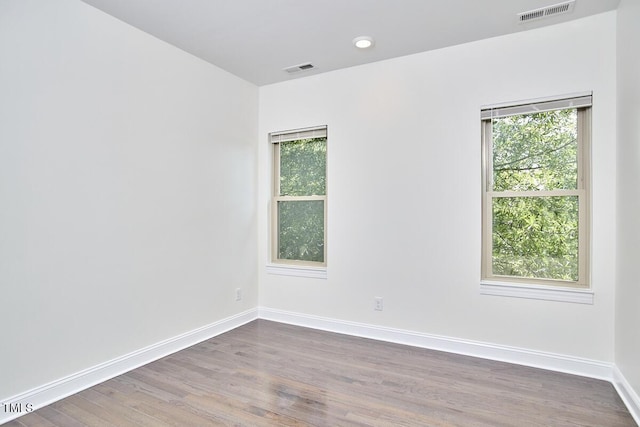 931 Ramseur St, Durham, NC 27701 - unfurnished room with plenty of natural light and wood finished floors