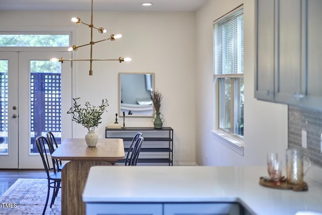 931 Ramseur St, Durham, NC 27701 - dining space with french doors and wood finished floors