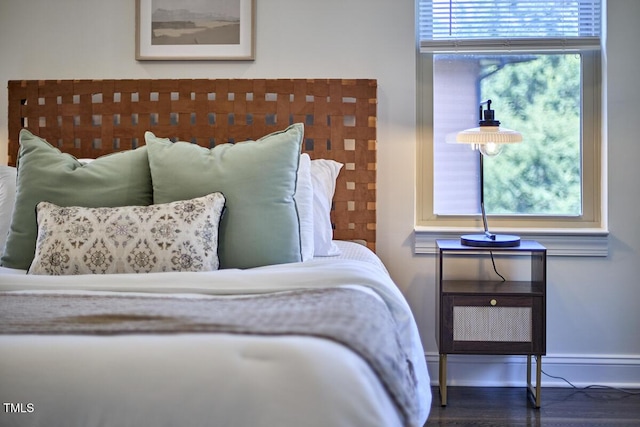 931 Ramseur St, Durham, NC 27701 - bedroom featuring wood finished floors and baseboards