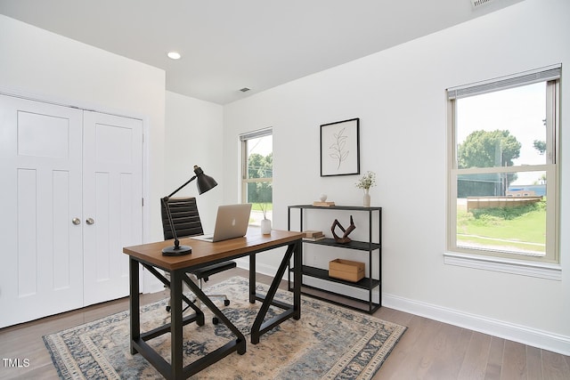 931 Ramseur St, Durham, NC 27701 - office featuring wood finished floors and recessed lighting