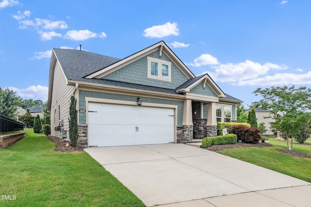 1409 Pulitzer Ln, Durham, NC 27703 - craftsman house with stone siding, a front lawn, concrete driveway, roof with shingles, and a garage