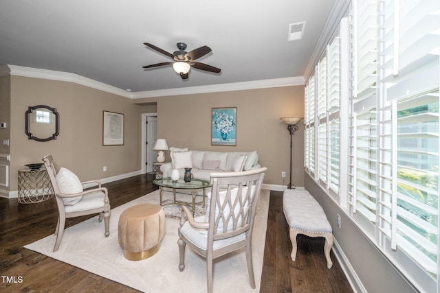 1409 Pulitzer Ln, Durham, NC 27703 - living room with plenty of natural light, a ceiling fan, wood finished floors, and ornamental molding