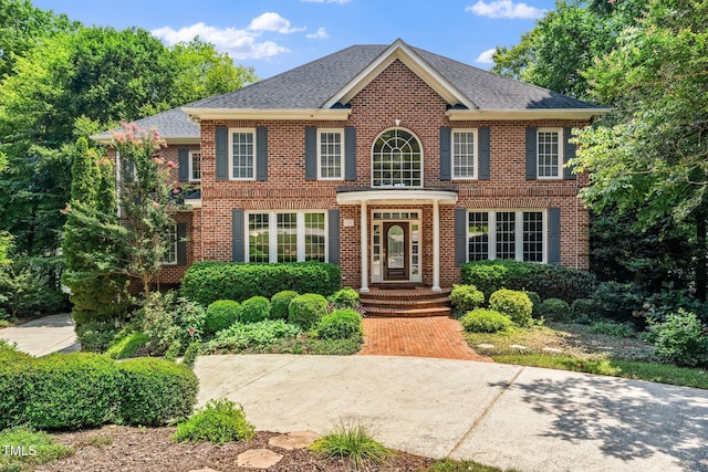 115 Loch Vale Ln, Cary, NC 27518 - colonial inspired home featuring brick siding and roof with shingles