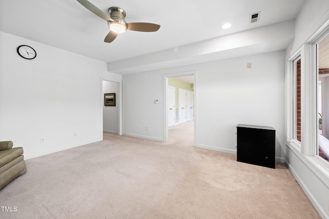 115 Loch Vale Ln, Cary, NC 27518 - unfurnished living room featuring carpet, a ceiling fan, healthy amount of natural light, and recessed lighting