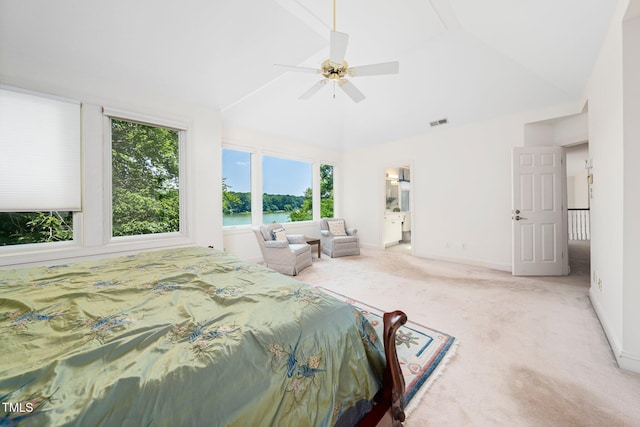 115 Loch Vale Ln, Cary, NC 27518 - carpeted bedroom featuring multiple windows, high vaulted ceiling, a ceiling fan, ensuite bath, and a water view