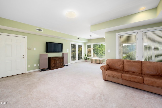 115 Loch Vale Ln, Cary, NC 27518 - carpeted living room with baseboards