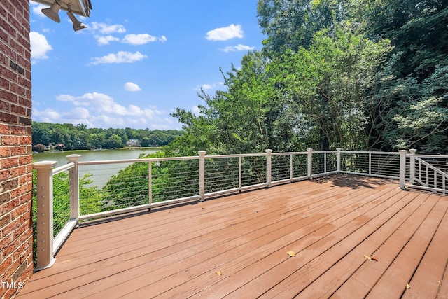115 Loch Vale Ln, Cary, NC 27518 - wooden terrace with a water view and view of wooded area