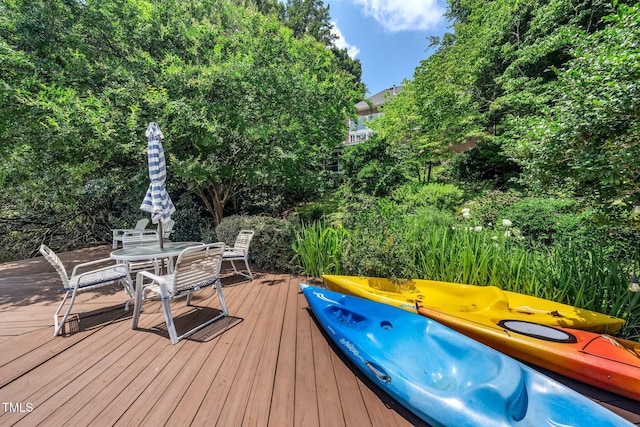 115 Loch Vale Ln, Cary, NC 27518 - wooden deck with outdoor dining area