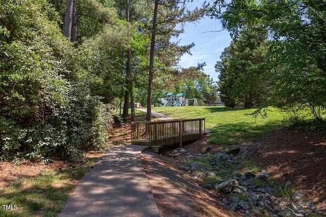 303 Saint Thomas Dr, Chapel Hill, NC 27517 - surrounding community with a lawn