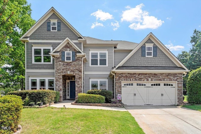 108 Holly Glen Ct, Holly Springs, NC 27540 - craftsman-style home with stone siding, driveway, a front yard, and an attached garage