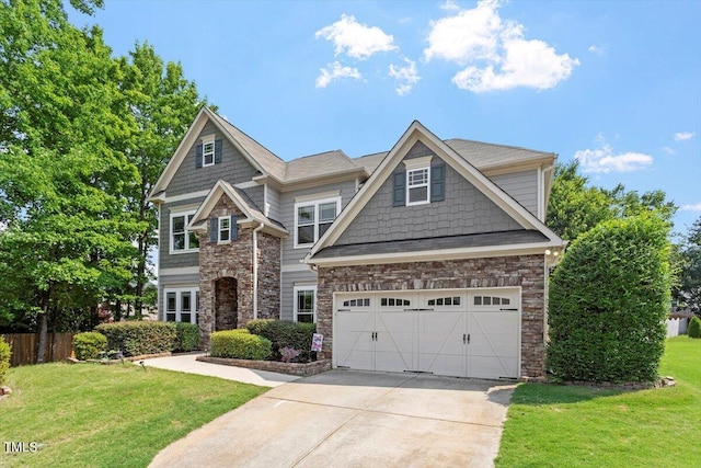 108 Holly Glen Ct, Holly Springs, NC 27540 - craftsman-style home with concrete driveway, stone siding, and an attached garage