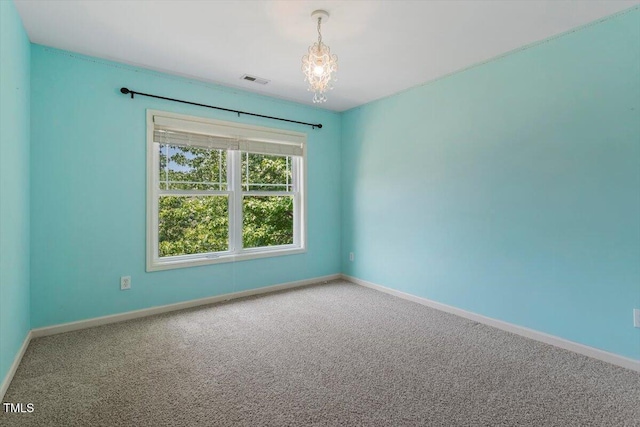 108 Holly Glen Ct, Holly Springs, NC 27540 - carpeted empty room featuring a chandelier and baseboards