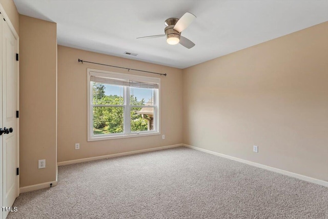 108 Holly Glen Ct, Holly Springs, NC 27540 - empty room with light colored carpet and a ceiling fan
