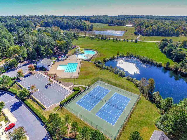 108 Holly Glen Ct, Holly Springs, NC 27540 - drone / aerial view of a pool and a nearby body of water