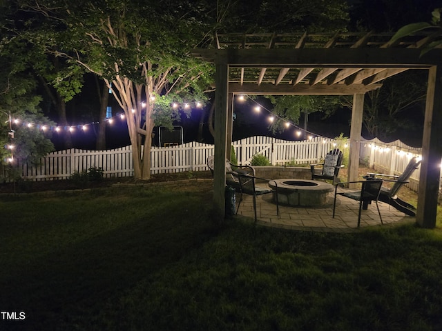 108 Holly Glen Ct, Holly Springs, NC 27540 - yard at night with an outdoor fire pit, a patio, and a pergola