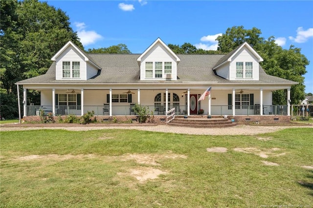734 Club Pond Rd, Raeford, NC 28376 - cape cod-style house featuring a ceiling fan, covered porch, and a front lawn