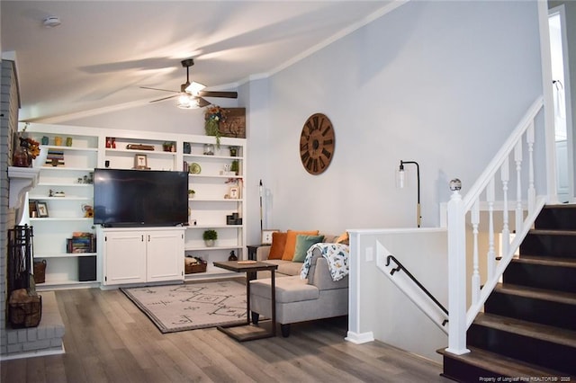 133 Bonnell Ct, Cary, NC 27511 - living room with vaulted ceiling, wood finished floors, ceiling fan, and stairs