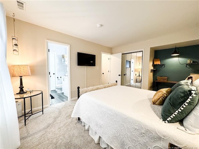 133 Bonnell Ct, Cary, NC 27511 - carpeted bedroom with baseboards and ensuite bathroom
