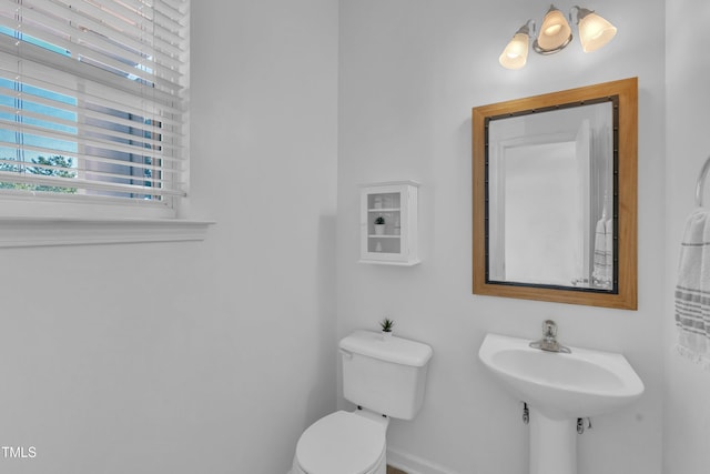 11309 Shadow Elms Ln, Raleigh, NC 27614 - bathroom with toilet and baseboards