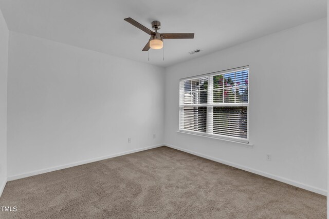 11309 Shadow Elms Ln, Raleigh, NC 27614 - carpeted empty room featuring baseboards and a ceiling fan