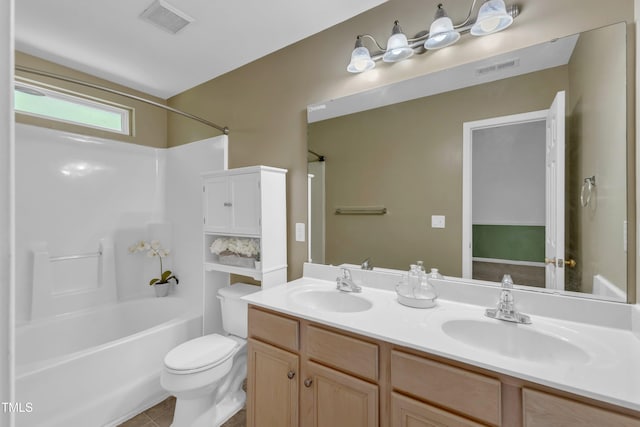 11309 Shadow Elms Ln, Raleigh, NC 27614 - bathroom featuring double vanity, washtub / shower combination, and tile patterned floors