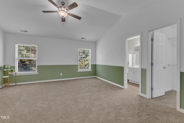 11309 Shadow Elms Ln, Raleigh, NC 27614 - carpeted empty room featuring ceiling fan and vaulted ceiling