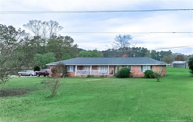 11821 N NC Highway 41, Lumberton, NC 28358 - ranch-style home featuring a front lawn and brick siding
